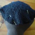 Pin hair piece evenly and stitch around.
